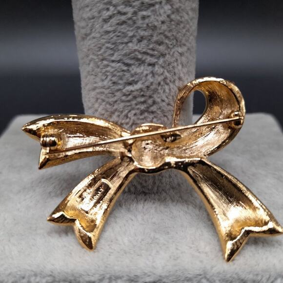 Vintage Monet Rhinestone Bow Brooch, Gold Plated, 1 1/2 Inches - Picture 3 of 9